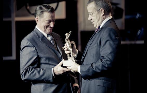 Estonian  President Toomas Hendrik Ilves hands the ‘Best Estonian Film of All Time Award’ to ‘Kevade’ director Arvo Kruusement